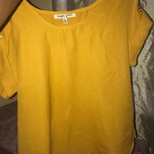 Nice yellow blouse shirt.